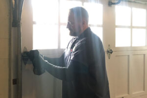 Big Guy working on a residential garage door